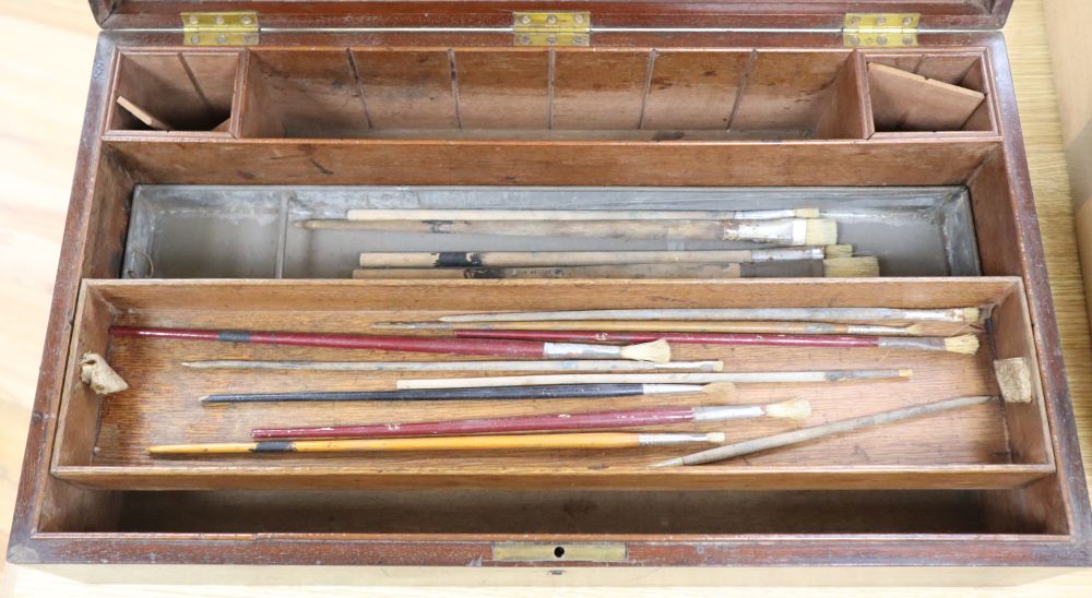 A 19th century mahogany artists paint box including brushes